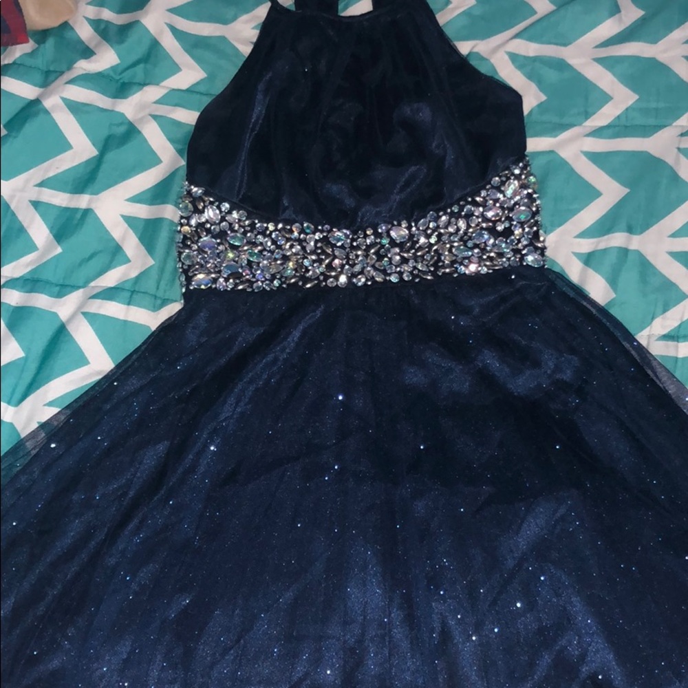 Navy blue sparkly dress with rhinestones.